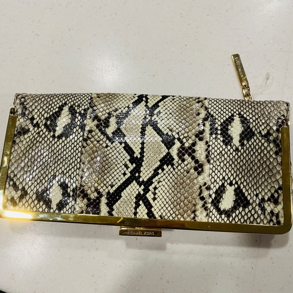 Michael Kors Handbags - MICHAEL KORS REAL PYTHON CLUTCH BRAND NEW